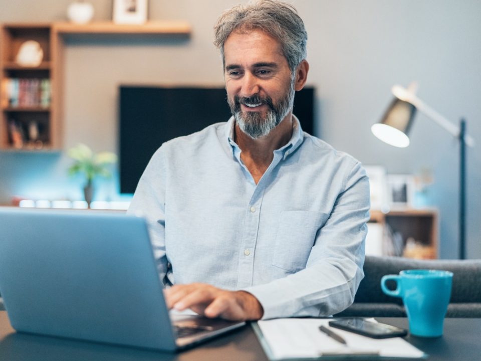 Man attending a webinar from home